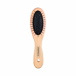 La brosse de massage de la marque TITANIA avec un manche en bois durable et des poils métalliques pour fournir une résistance ...