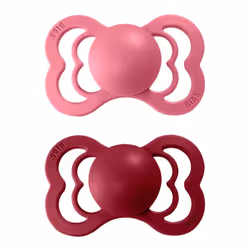 BIBS Supreme 2 Sucettes en Coral et Ruby propose des tétines en latex naturel avec boucliers doux et matériaux sans BPA. Fabr ...