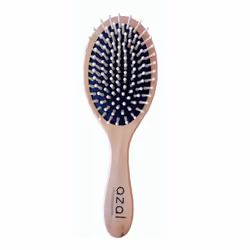 Brosse en bois alternative écologique aux brosses en plastique.