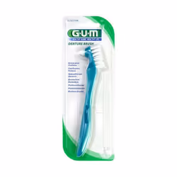 Cette brosse à dents de GUM a été spécialement conçue pour le nettoyage des prothèses dentaires.