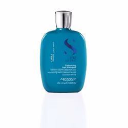 Enhancing Low Shampoo Il nettoie, hydrate et démêle les cheveux, tout en les rendant doux et en les libérant des frisottis. s ...