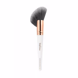 Le pinceau de maquillage a des poils synthétiques très épais.
